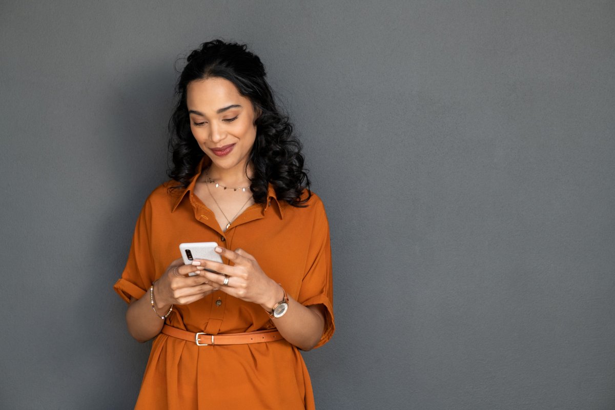 Woman uses telephone