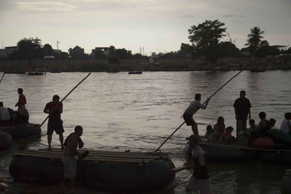 Migrants on rafts at the border with Mexico and Guatemala