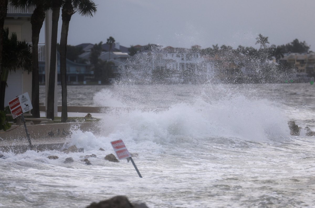 Hurricane Center issues warning of two storms merging