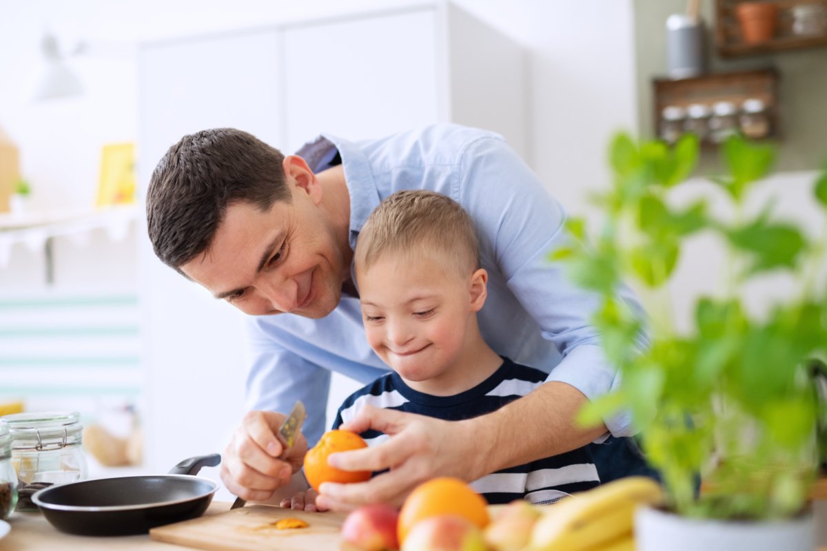 Happy father and son with Down syndrome