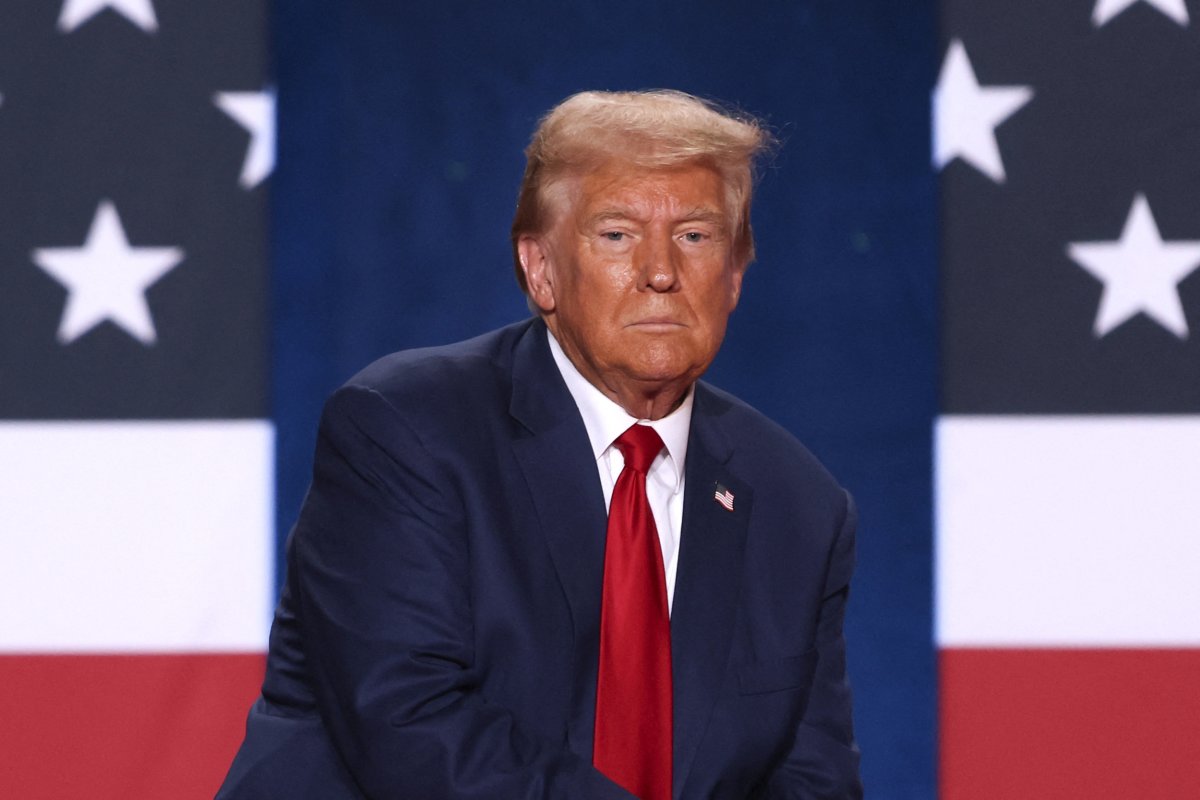 Donald Trump looks on during town hall