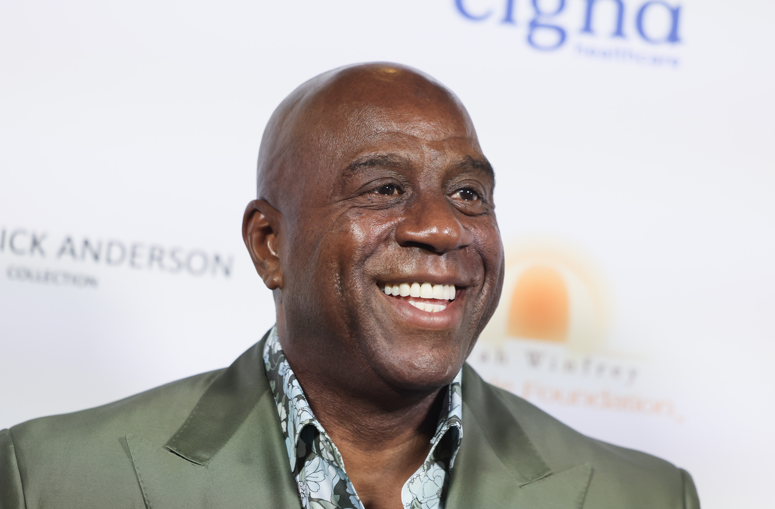 Dodgers Part Owner Magic Johnson Pick-And-Rolls with Presidential Candidate