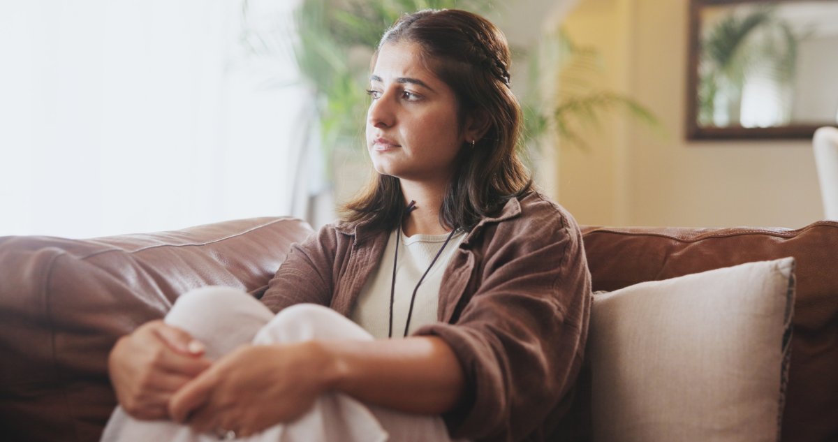Stock image of upset woman.