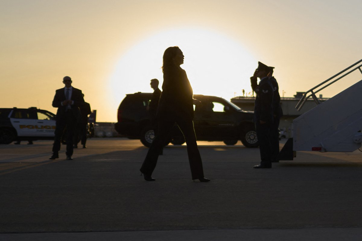 Harris Walks Across the Tarmac