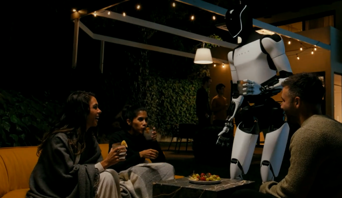 Tesla's Optimus robot serves drinks.