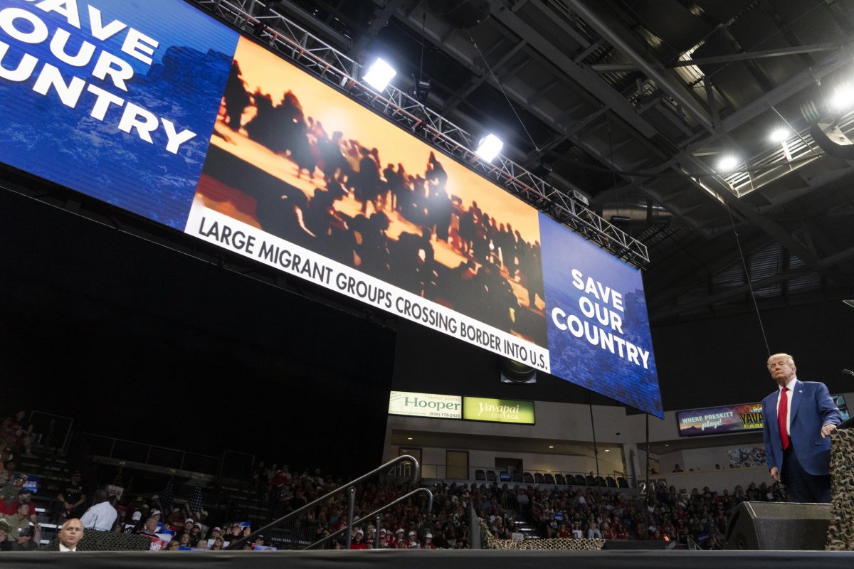 Trump plays a video during the rally