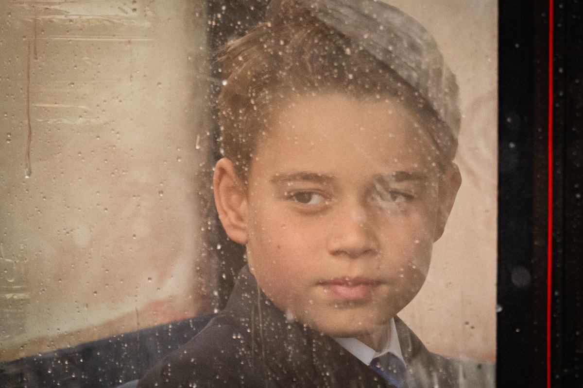 Prince George Watches Through Rainy Window