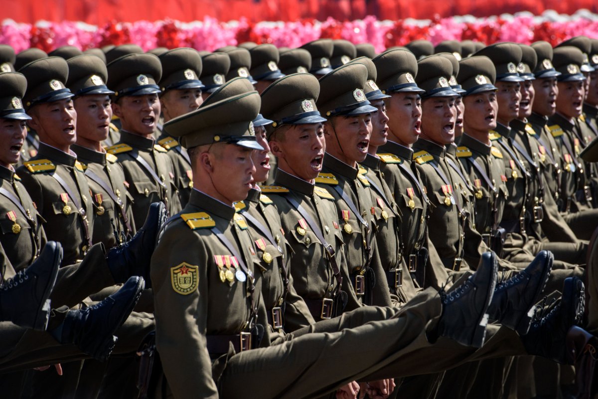 North Korean Troops March at Rally 