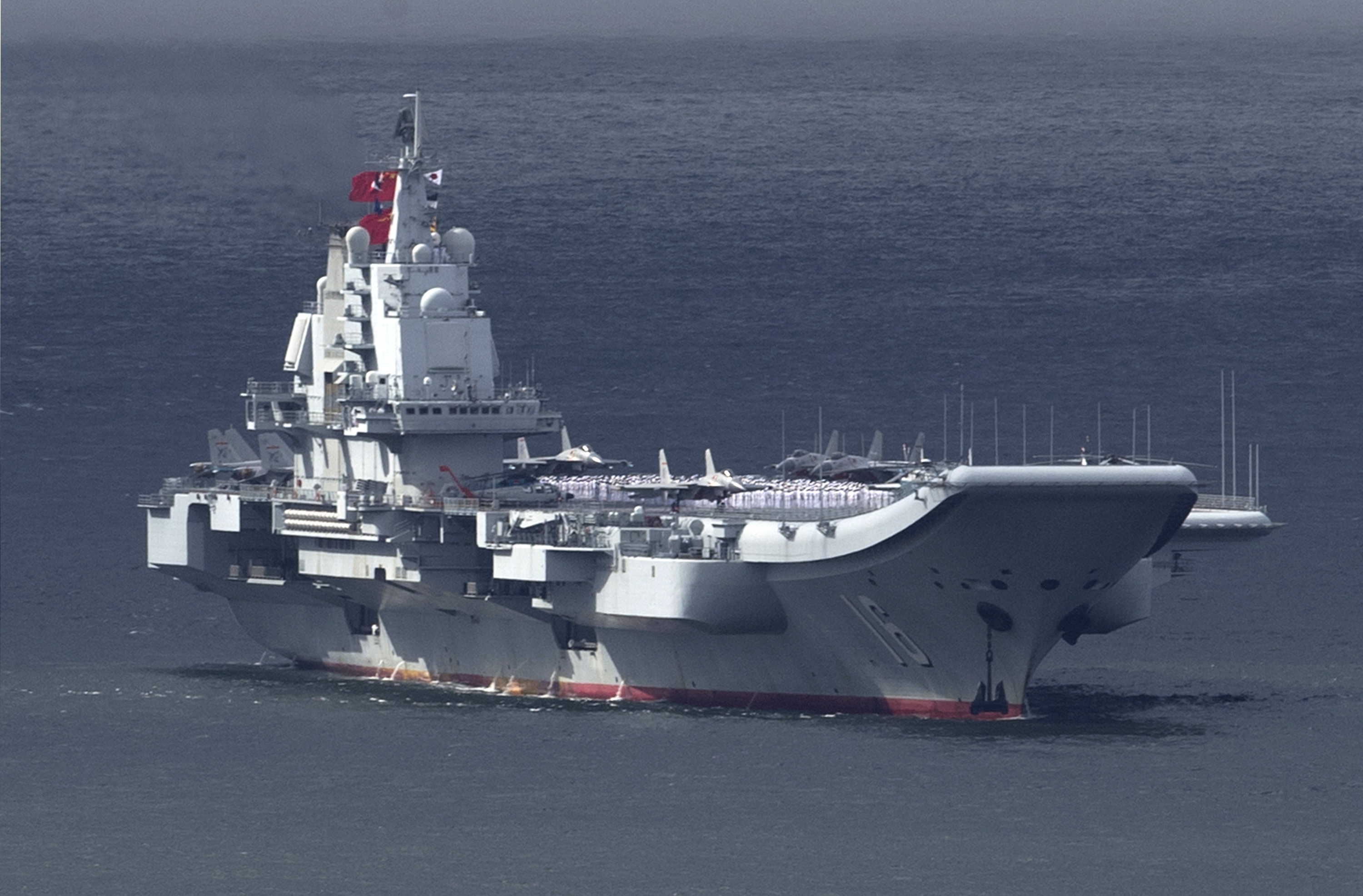 China Sails Aircraft Carrier Through Contested West Pacific Waters