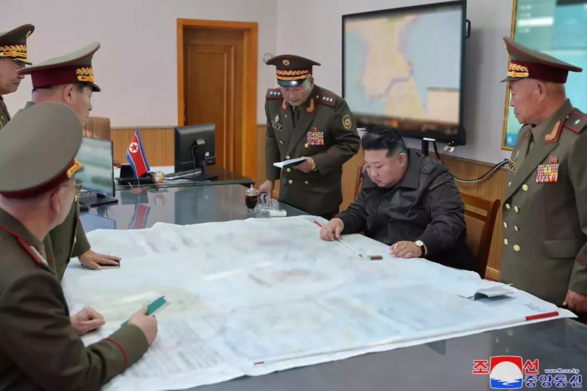 https://d.newsweek.com/en/full/2505398/kim-meets-army-officers-during-inspection.webp