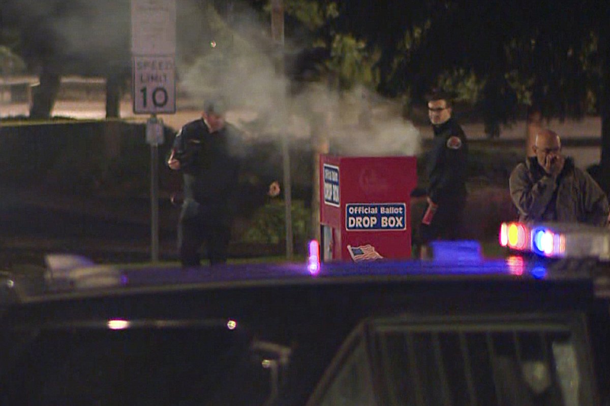 smoke pouring out of a ballot box