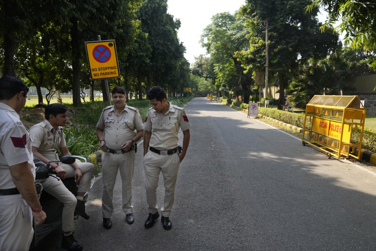 Police guard the entrance to the Canadian high commission