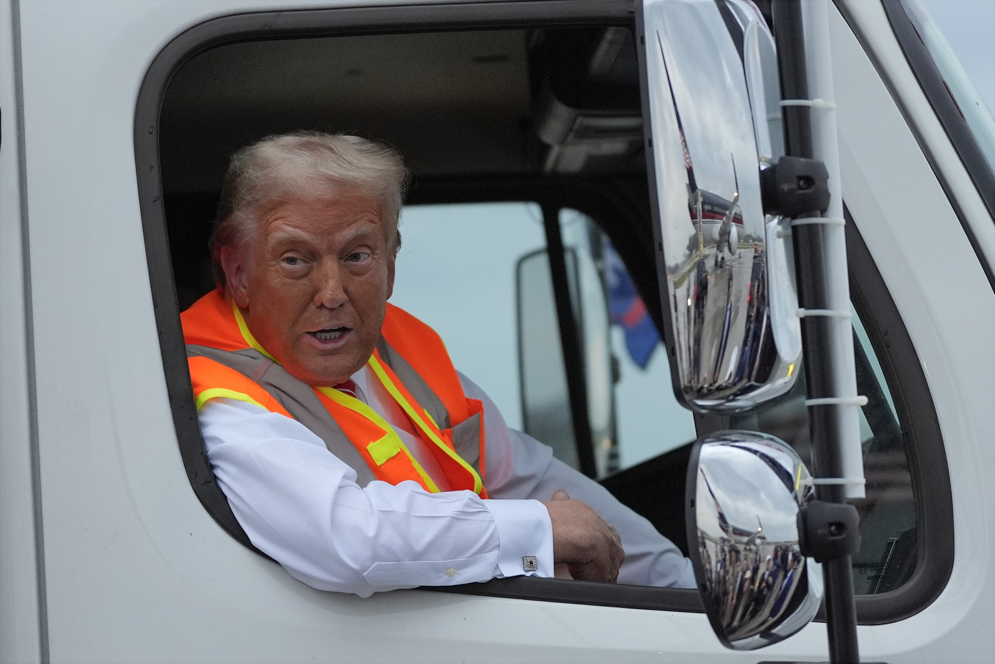 Trump Rides in Garbage Truck Ahead of Wisconsin Rally in Jab at Biden ...