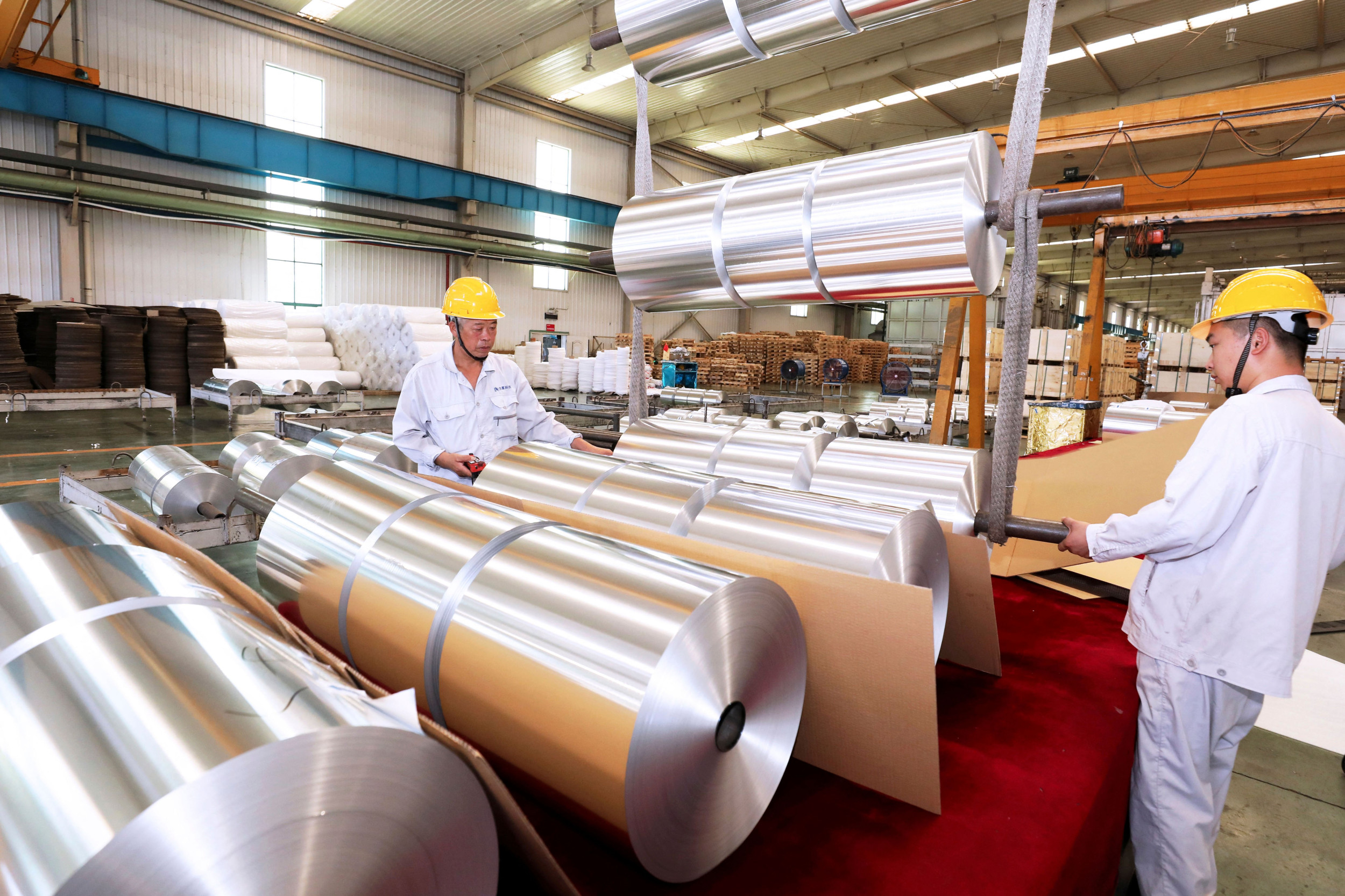 Workers Prepare Battery Aluminum Foil for Export