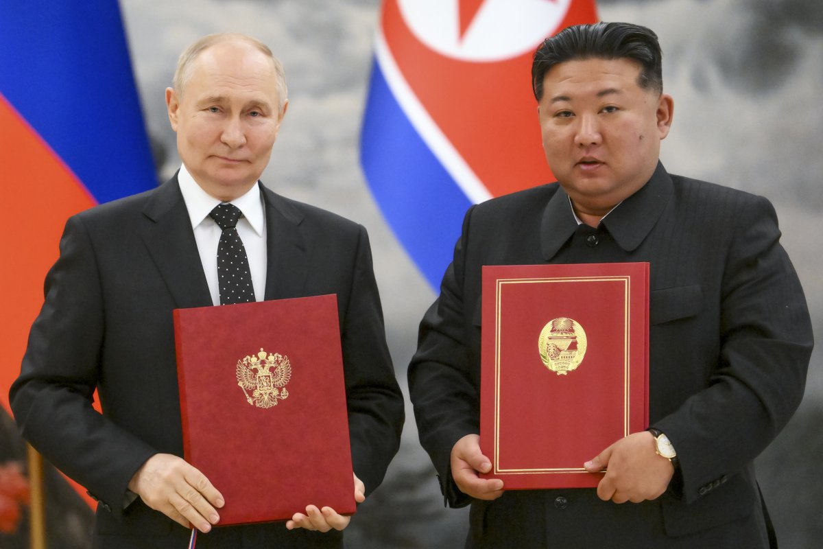 Vladimir Putin and Kim Jong Un