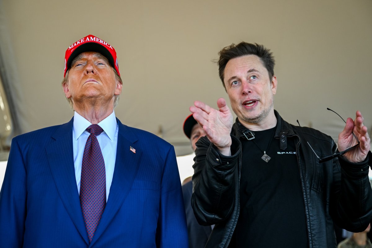 Elon Musk speaks with President-elect Donald Trump