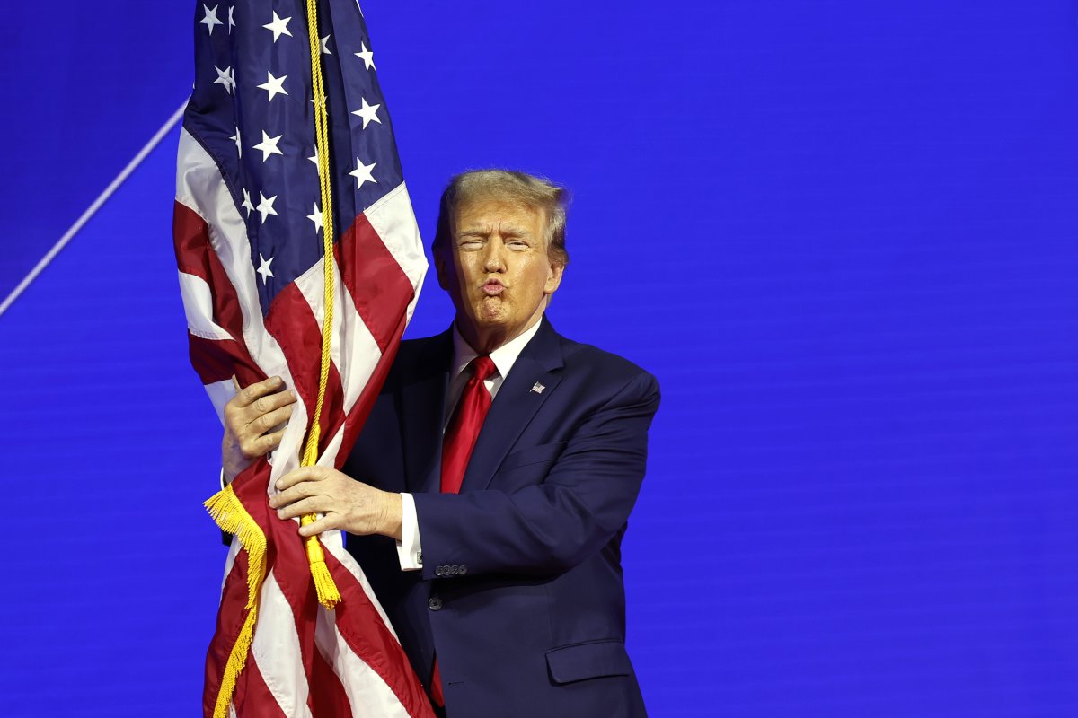 trump hugs flag