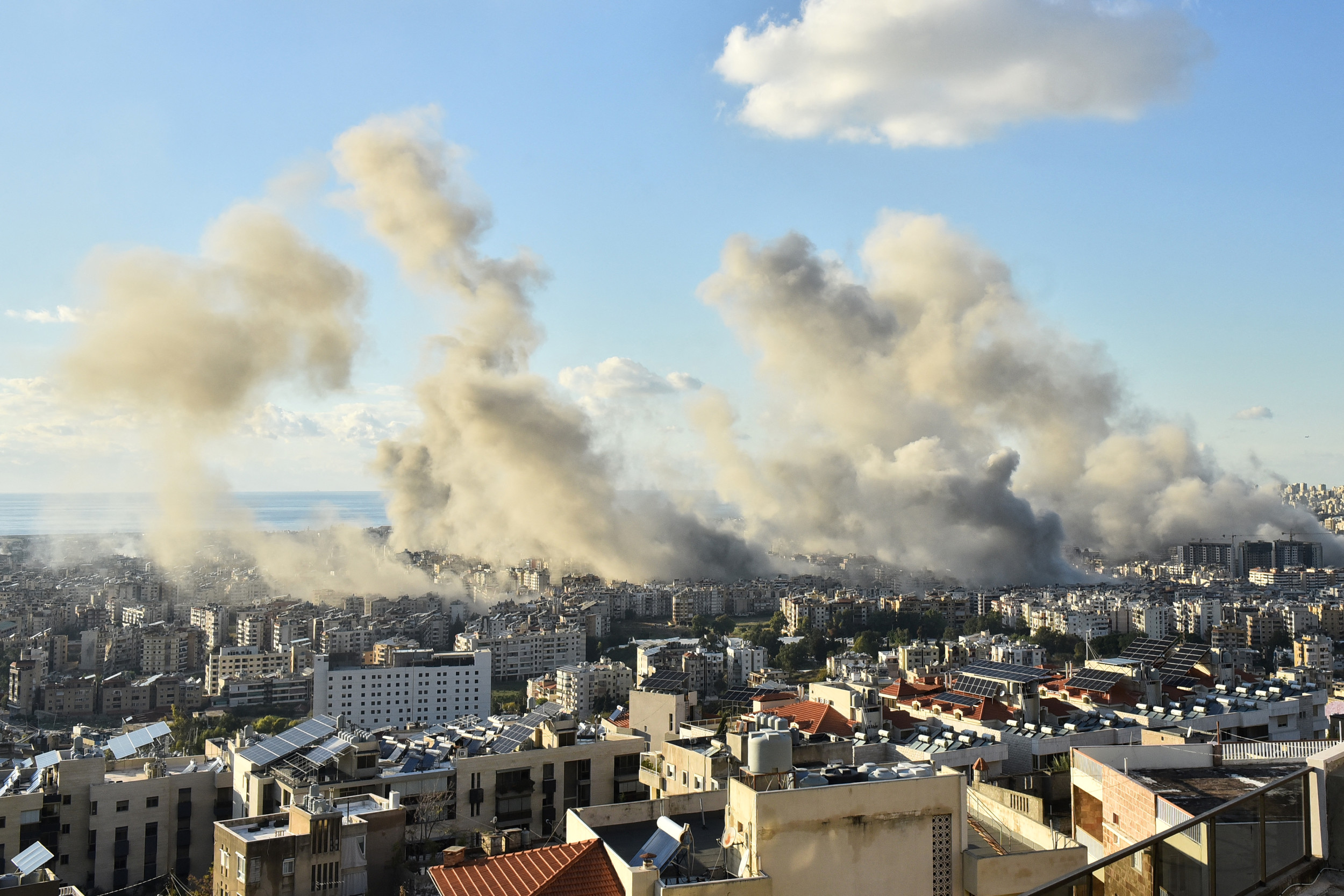 Smoke billows above Beirut's southern suburbs following Israeli airstrikes on November 26. (FADEL ITANI/Getty Images)