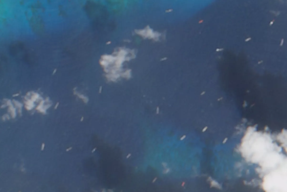 Satellite photos capture Chinese ship swarm near US ally's territory