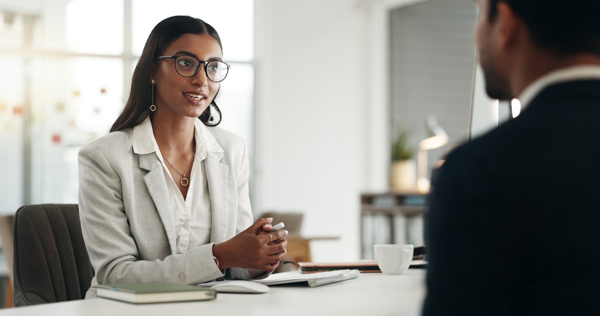 Woman conducting job interview.