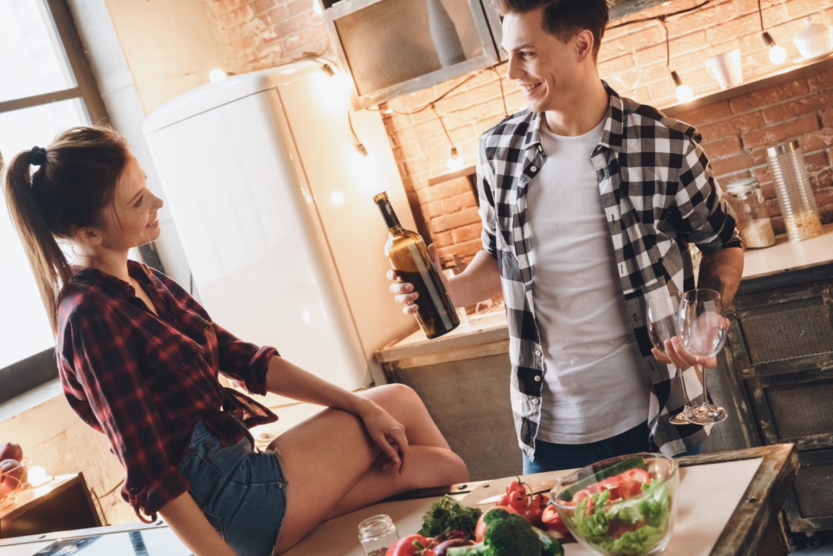 Couple having romantic dinner at home.