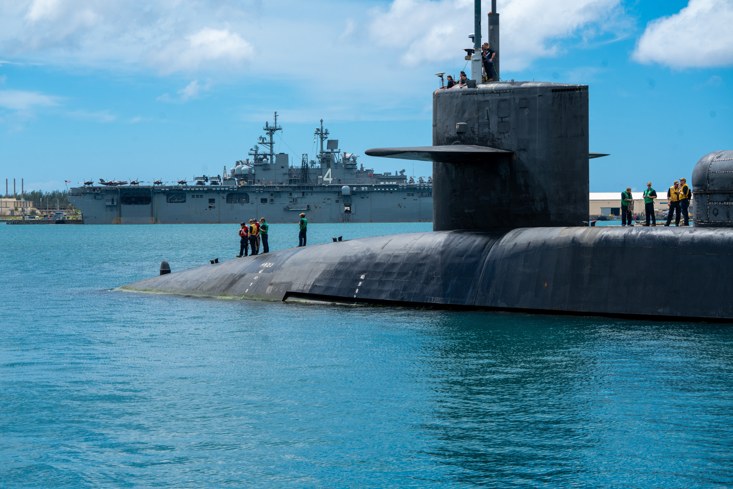 Surfaces of US cruise missile submarines at a Western Pacific outpost