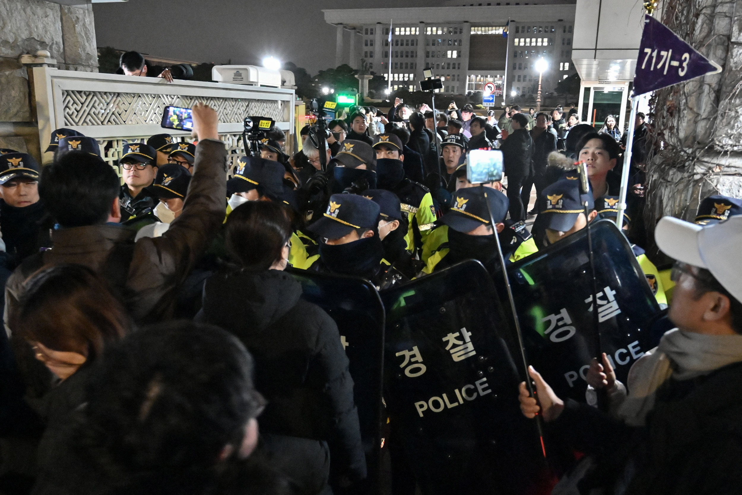 South Korea Martial Law: Protesters Clash With Police - Newsweek