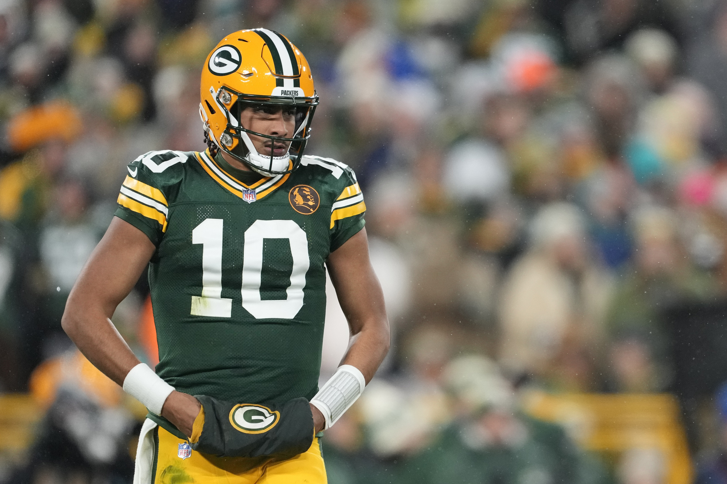 Packers' Love, Watson Injured in Finale