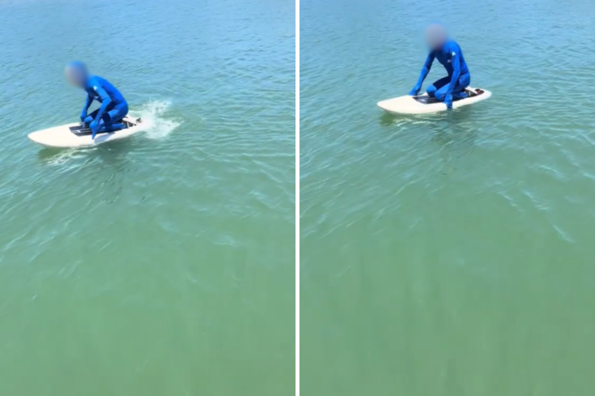 A man paddle-boarding in Australia