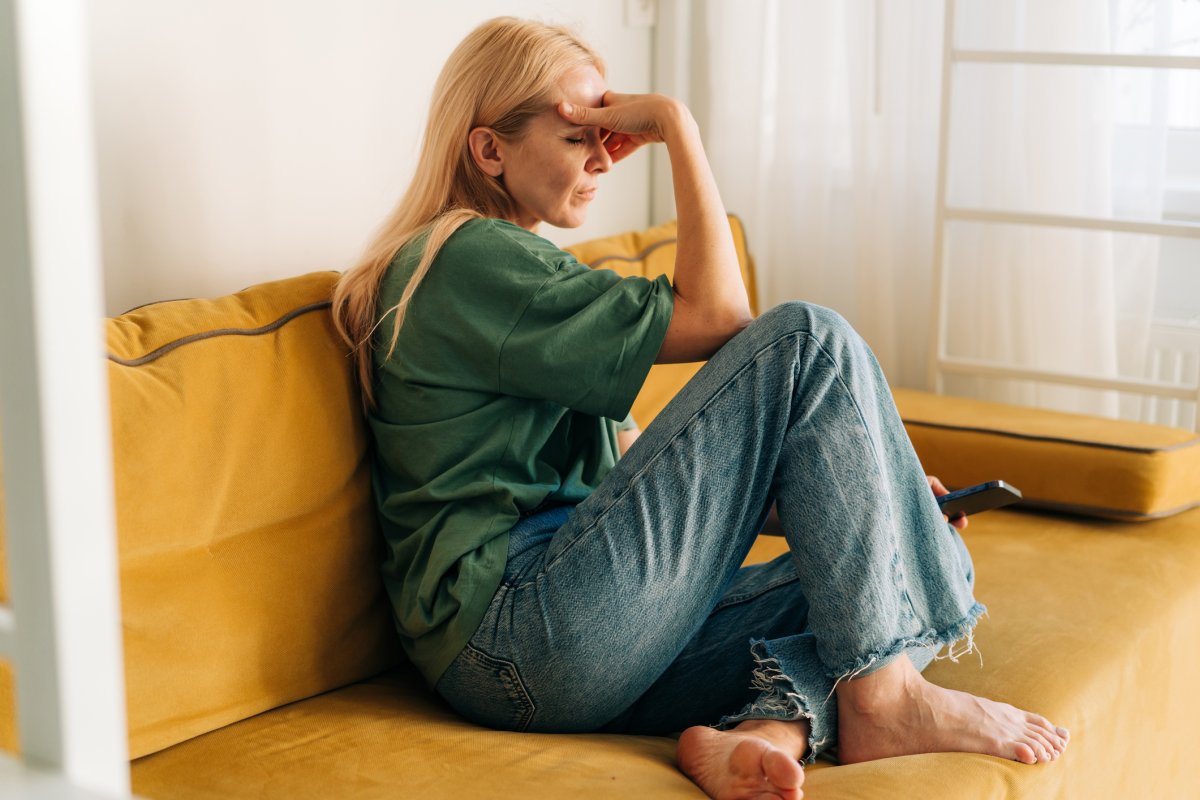 Stock image of sad woman.