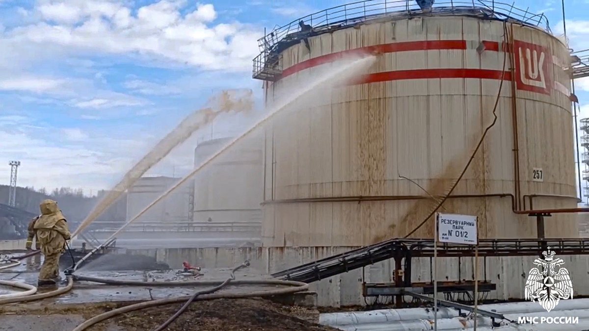 Firefighters Putting Out Russian Oil Refinery Fire