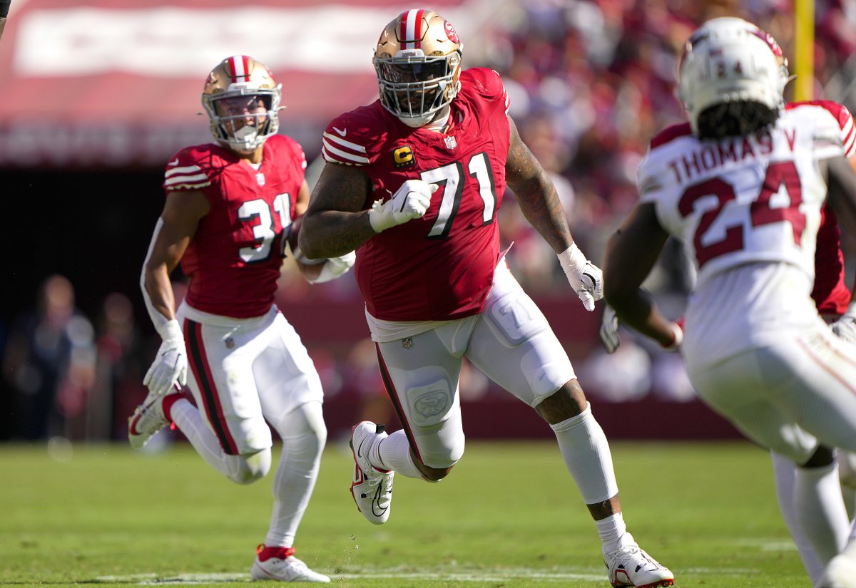 San Francisco 49ers Isaac Guerendo Trent Williams