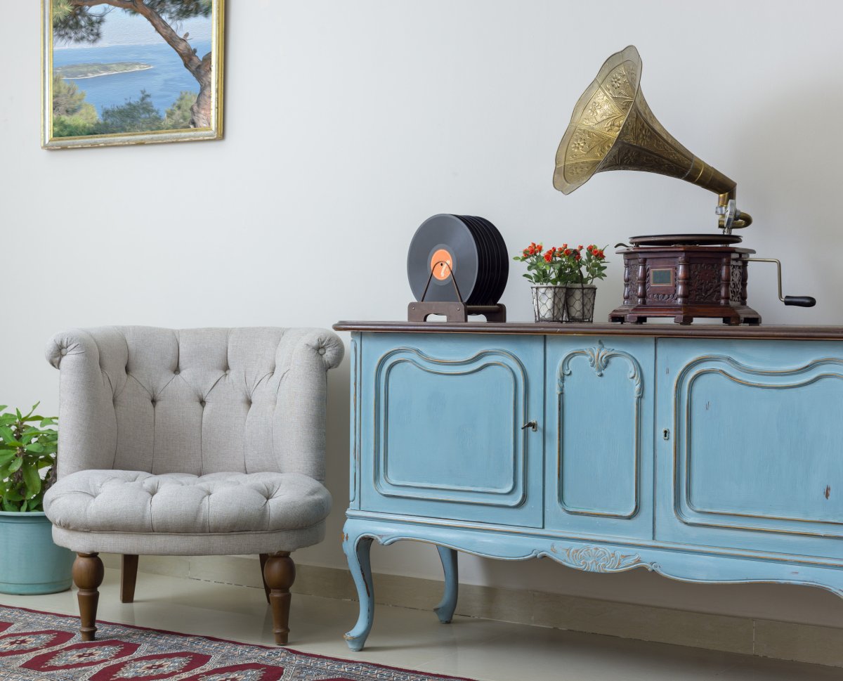 Vintage style armchair and sideboard.