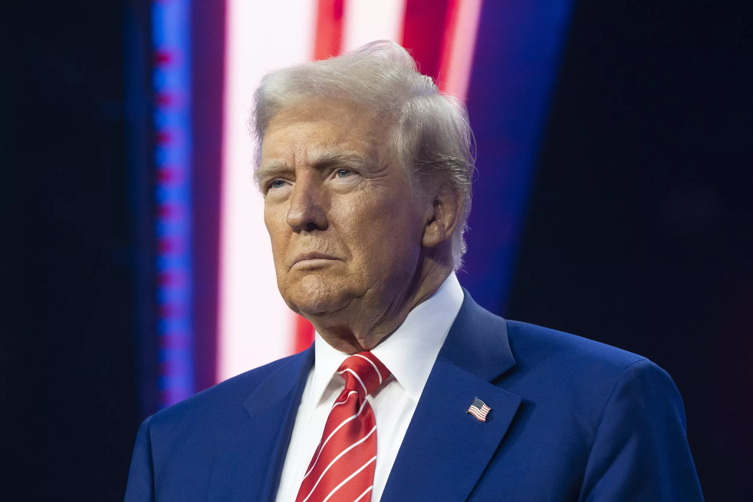 Donald Trump teases Greenland deal as son makes surprise visit