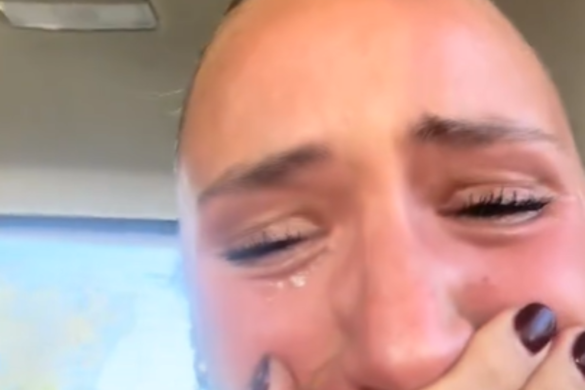 Woman crying in an Uber