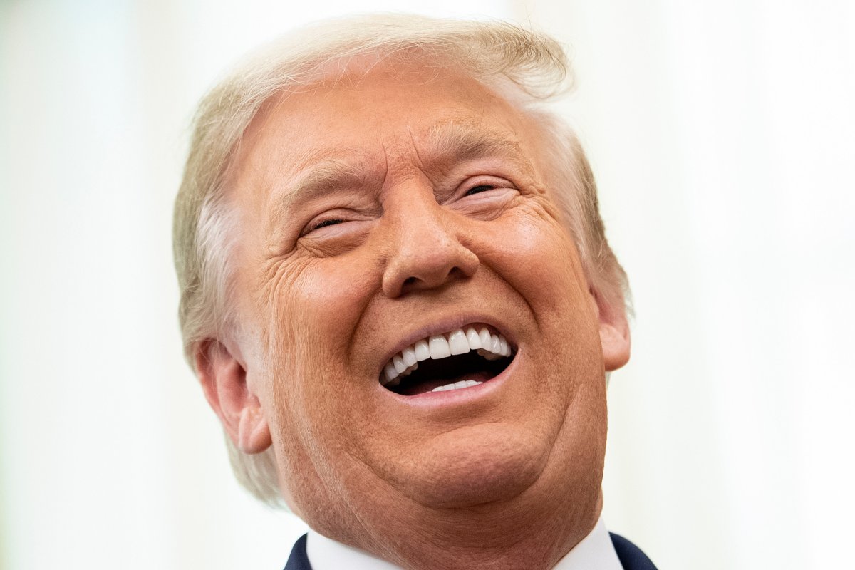President Donald Trump laughs