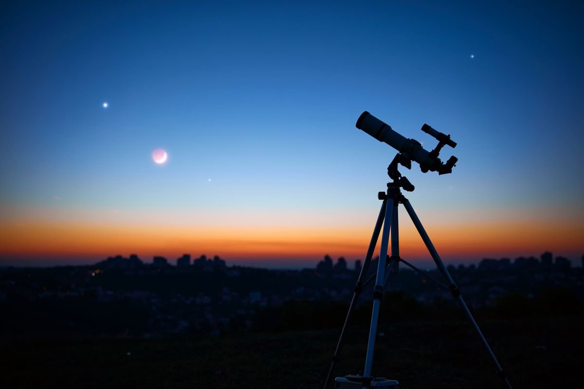 Astronomical telescope under a twilight sky