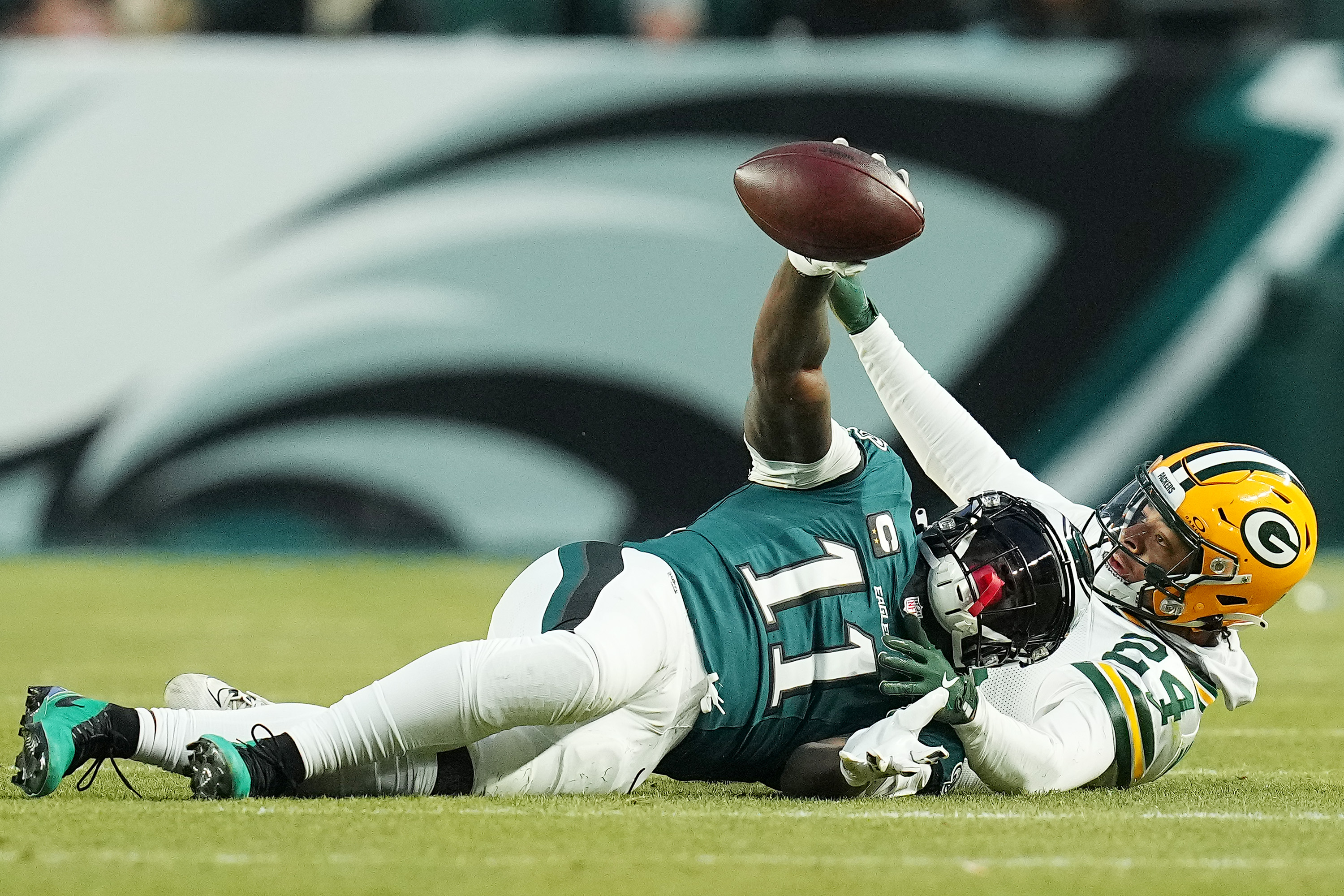 Eagles AJ Brown Viral Book Moment in Playoff Game Mimicked by News Anchors