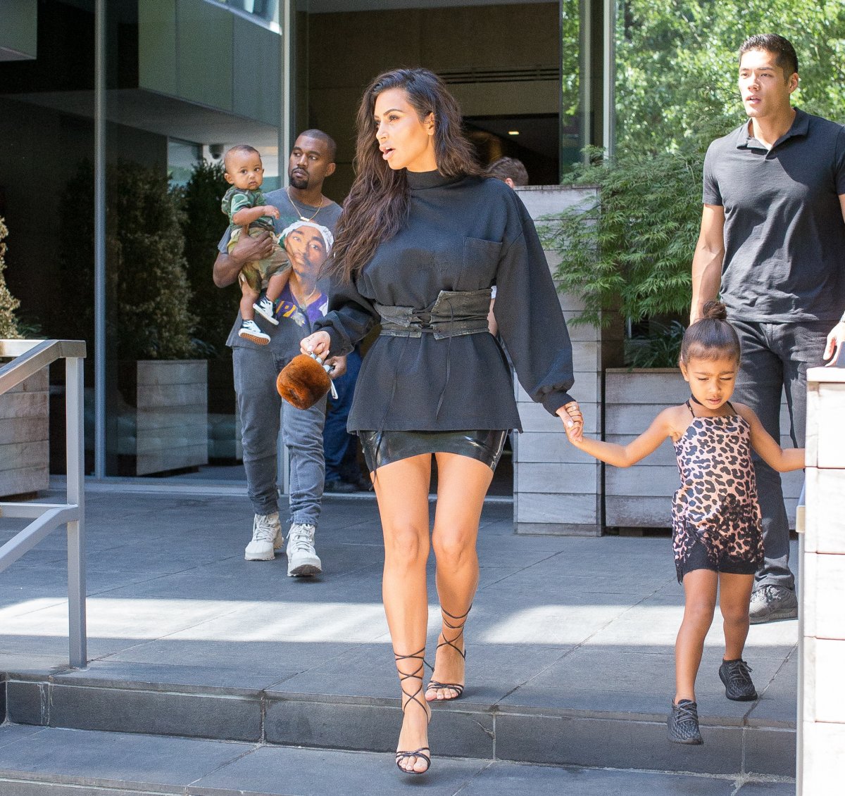 Kim Kardashian and Kanye West with children