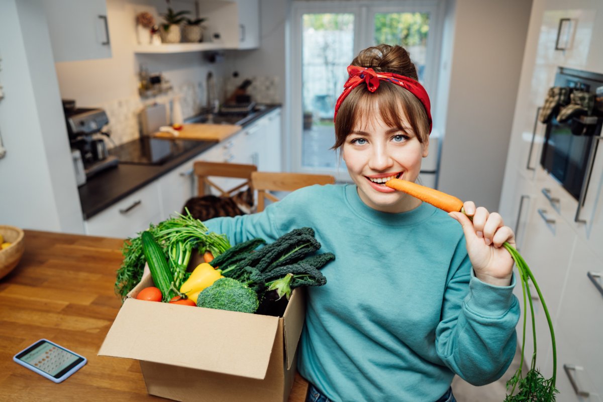 Woman munching carrot