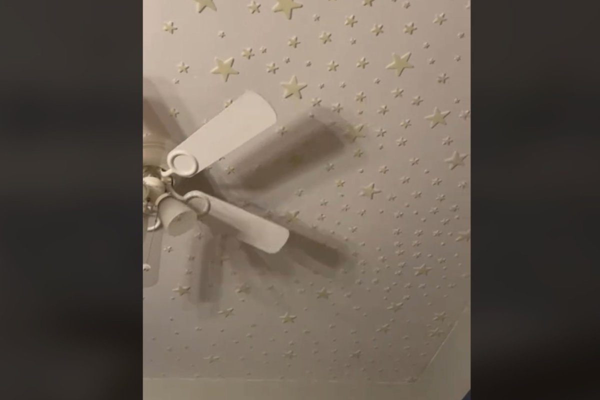 Star stickers on ceiling of bedroom.