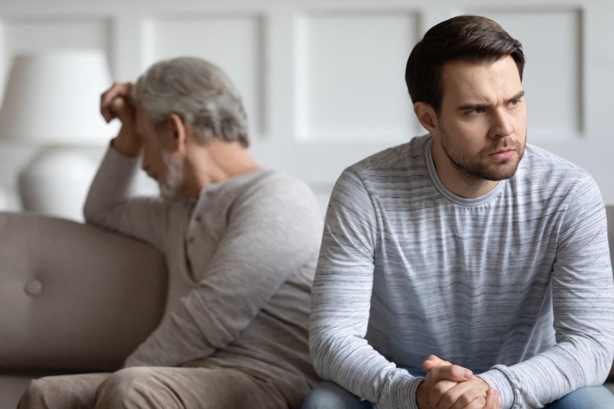 A man and his father in conflict