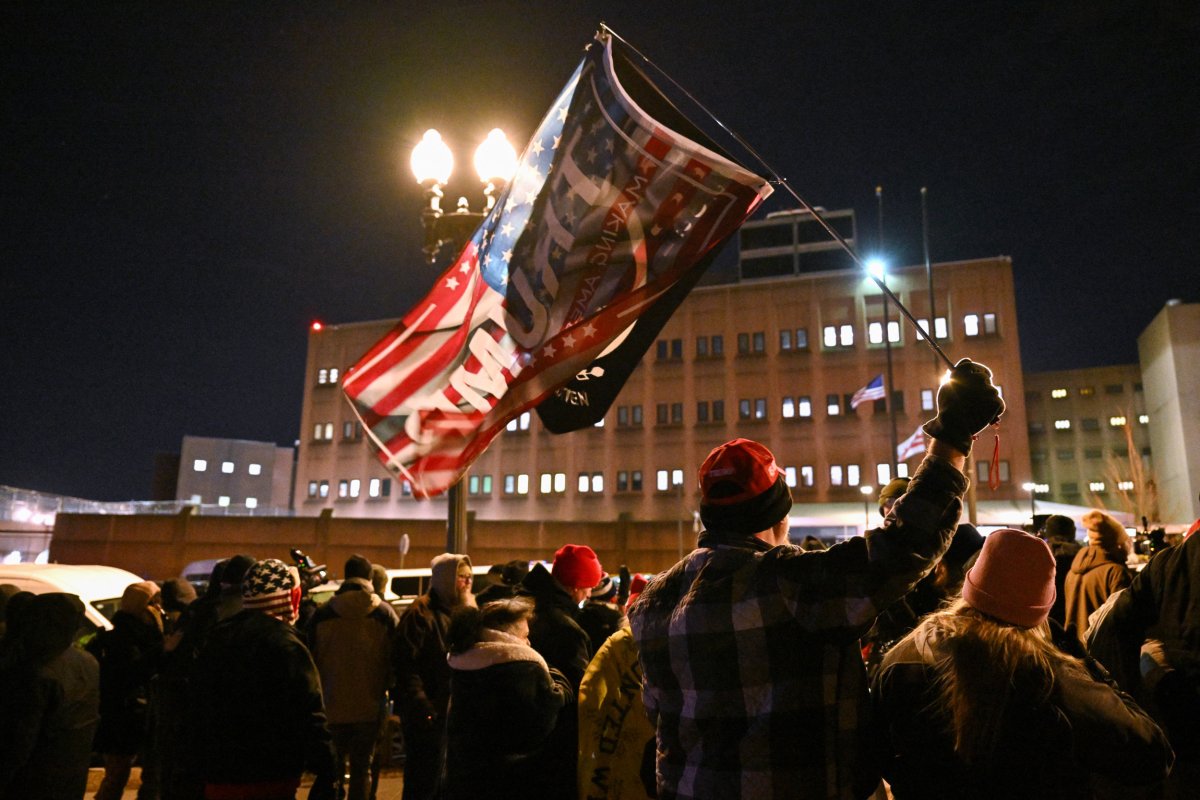 People wait outside DC Central Detention Facility