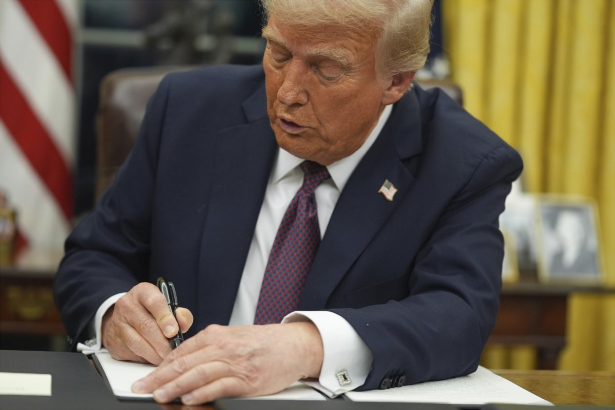 Donald Trump signs an executive order 