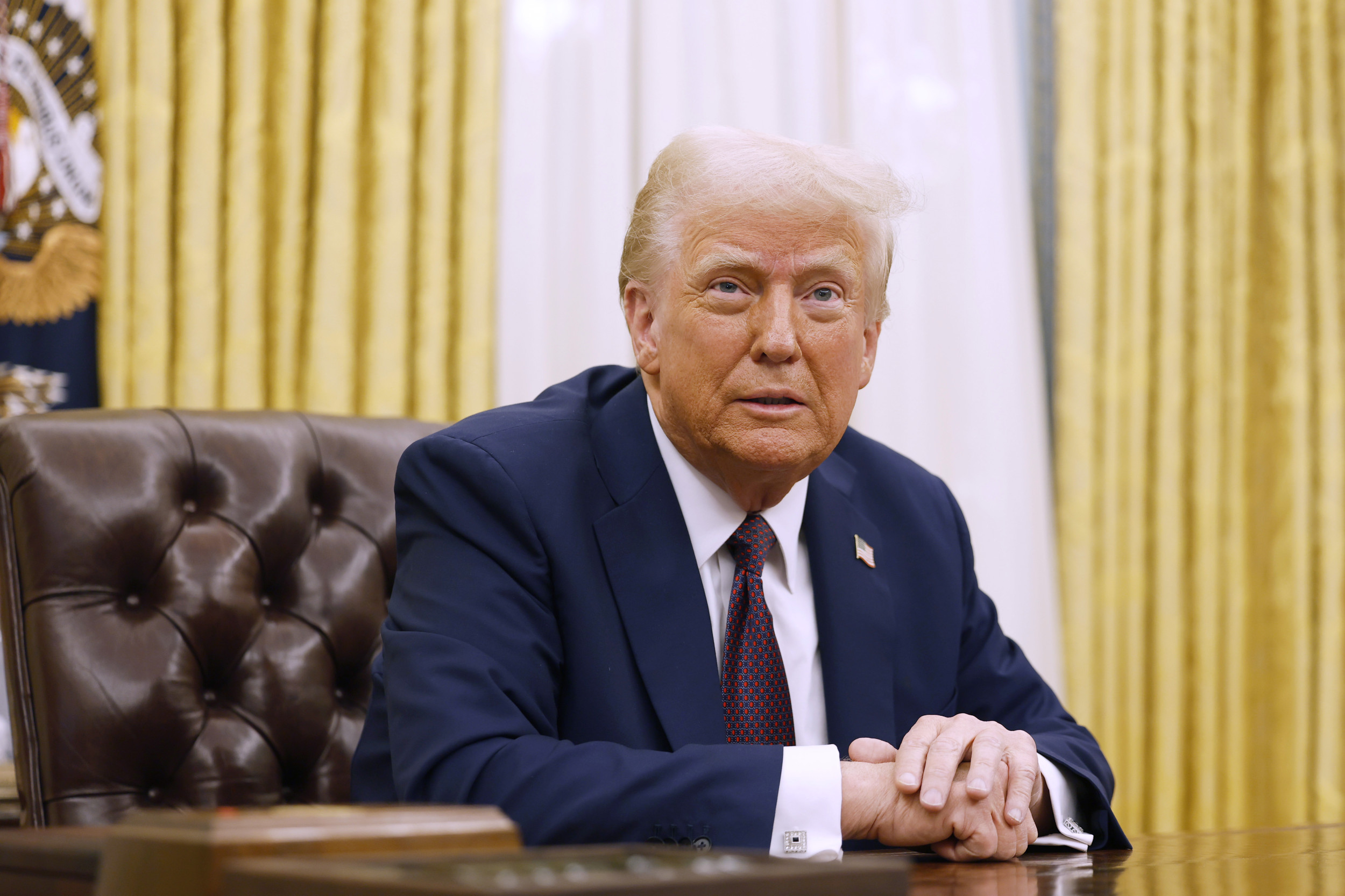 Donald trump s sweeping federal funding freeze temporarily halted by