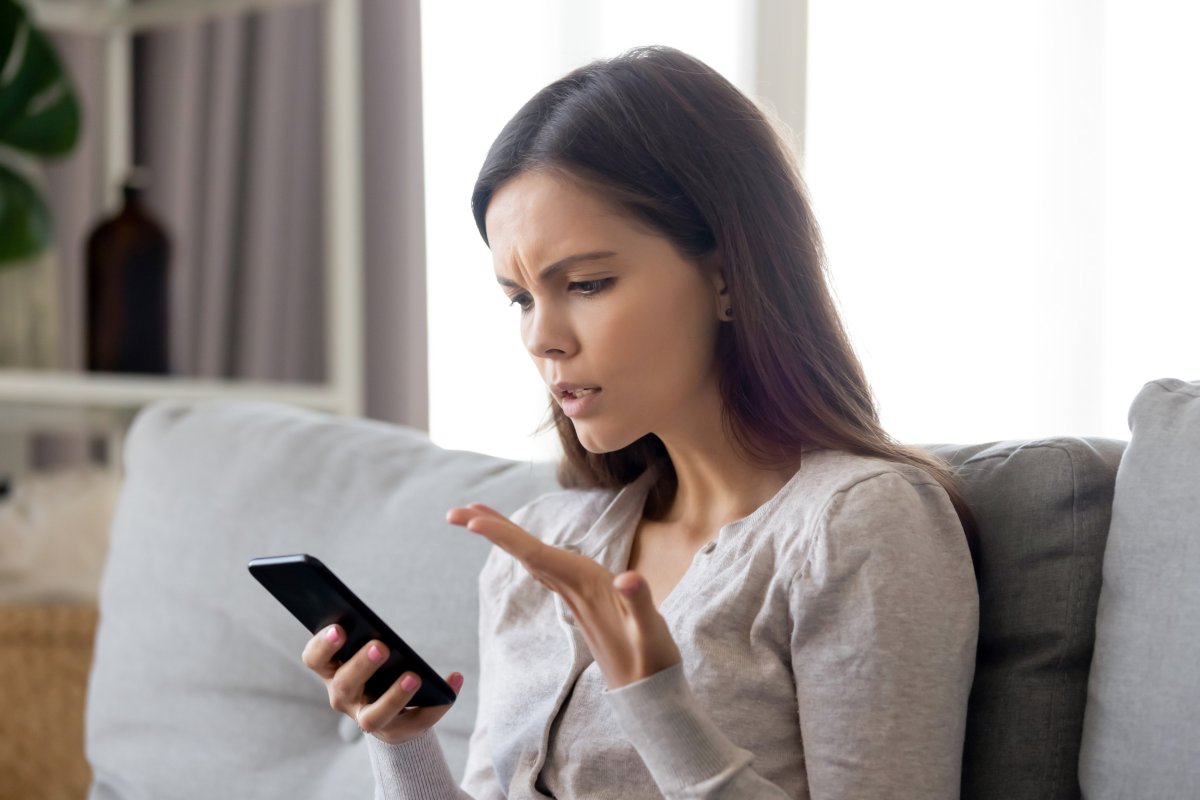 Woman looks at phone