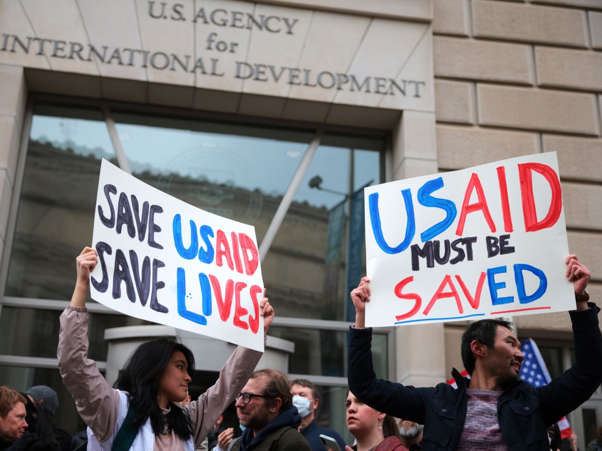 Protestors gather outside of USAID headquarters 