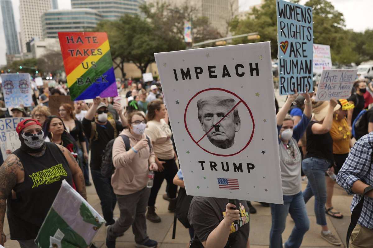 Protests march in rally against Trump