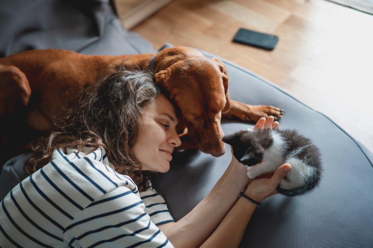 A woman and a dog.