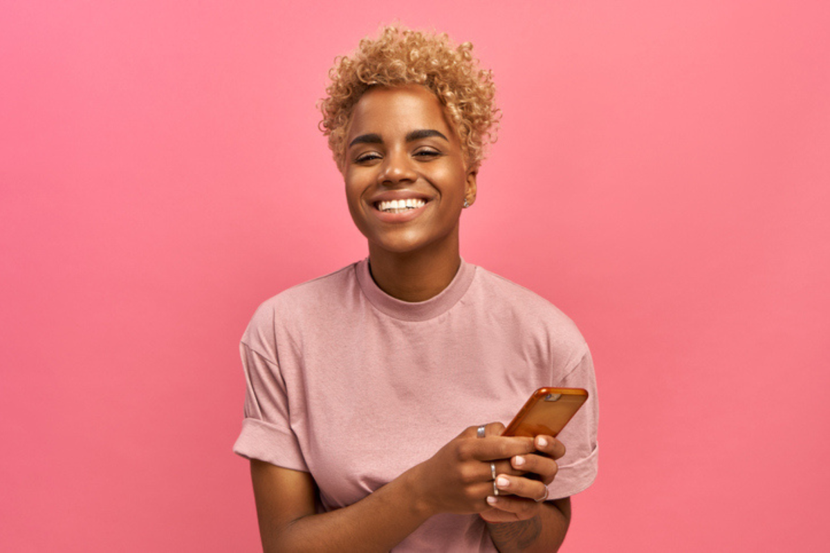 Woman Pink Shirt Pink Background Mobile Phone